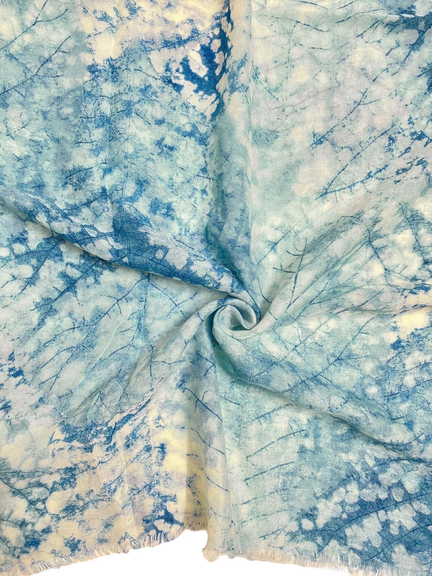 Ayla Printed Hijabs - French Blue: A close-up of a soft, flowing hijab in a beautiful French blue color with a subtle,