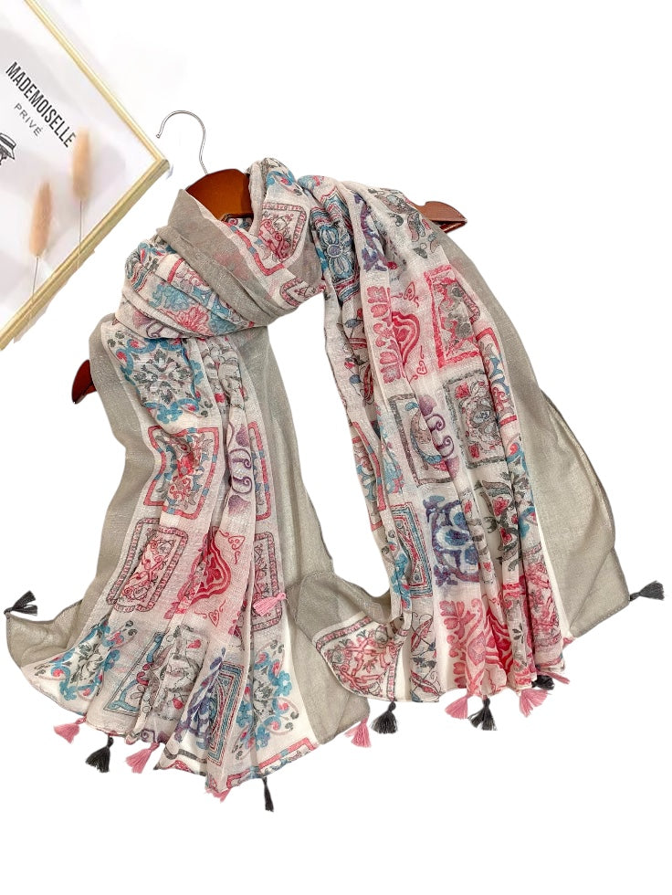 Premium Printed Hijab with a delicate floral pattern in soft pink and green tones.