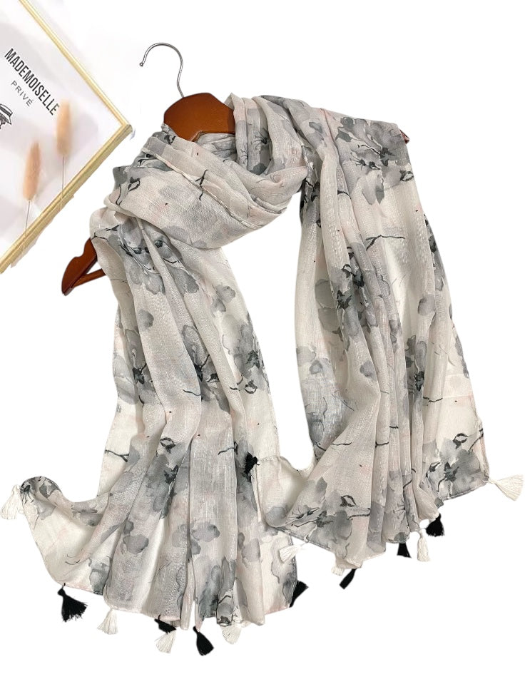 Premium Printed Hijab with an intricate floral pattern in shades of navy and gold.